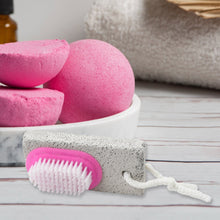 Hand and foot scrubber brush with pumice stone for callus removal.