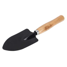 Black handle steel hand trowel for digging.