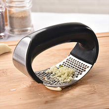 Durable stainless steel garlic crusher in vibrant colors.