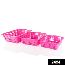 Multiple size plastic fruit baskets, large, medium, and small