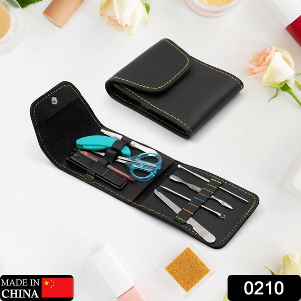 Manicure set with nail clippers, scissors, and file in a compact case